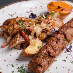 Delicious  fried sausages with sauce