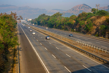 The Mumbai Pune Expressway early morning near Pune India. The Expressway is officially called the...