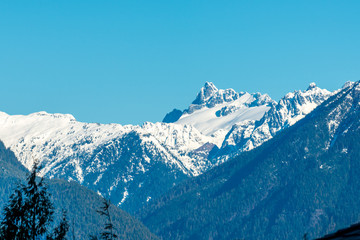 Fototapeta na wymiar View at snow mountains in British Columbia, Canada.