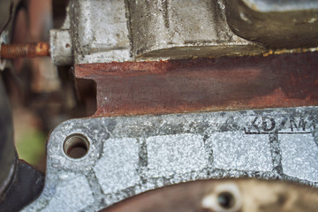 rusty unreadable car engine number