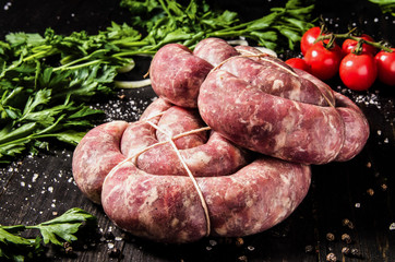 raw pork sausages with herbs 