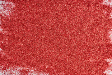 Abstract texture. A red glitter background
