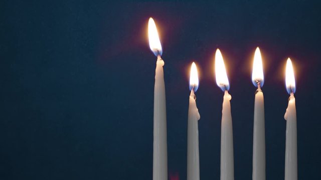 Video Of Four Lit Hanukkah Candles ON GRUNGE BACKGROUND And Shamash