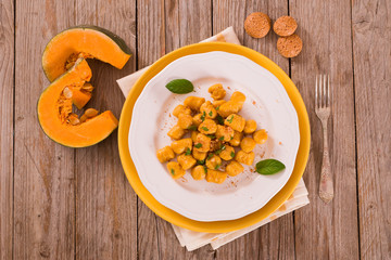Pumpkin gnocchi with grated amaretti cookies.