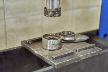 close-up press for replacing parts in a car service