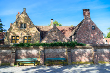 Old european houses of red brick with chimneys