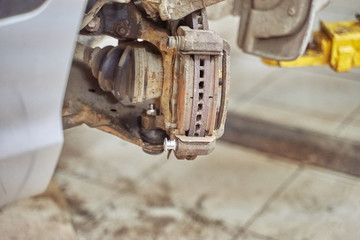 Car brake replacing new caliper pin. car repair, suspension parts, garage repair. car brake system.