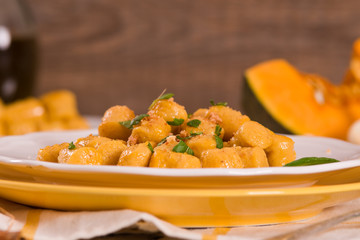 Pumpkin gnocchi with grated amaretti cookies.
