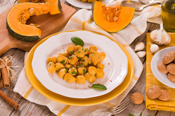 Pumpkin gnocchi with grated amaretti cookies.