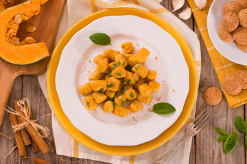 Pumpkin gnocchi with grated amaretti cookies.