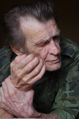 portrait of a blind and deaf elderly man veteran