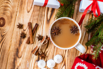 Christmas mug of hot cocoa on wooden background. Christmas mood in detail.