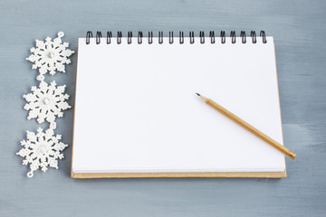 Empty letterhead for santa claus. Christmas wish concept. Empty notebook with christmas decorations. Flat layout. Copy space.