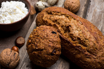 whole grain bread on wooden background close-up