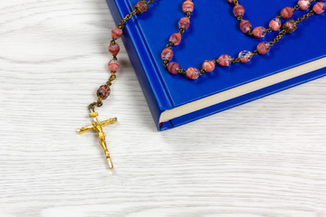 Rosary Lying on a Book