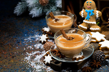 winter treats, masala tea and gingerbread man cookies, top view