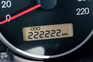 Car odometer reaches a two hundred and twenty-two thousand two hundred and twenty-two kilometres.. - obrazy, fototapety, plakaty