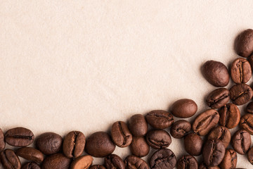 coffee beans on burlap background with copy space for text