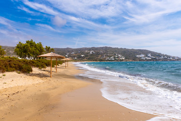 Plaka beach with crystal clear waters and the fine sand. Naxos, Cyclades, Greece - obrazy, fototapety, plakaty