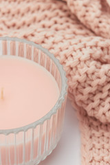 rose pastel candle on peach wool blanket cozy me time knitting