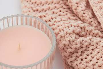 rose pastel candle on wool blanket cozy me time knitting