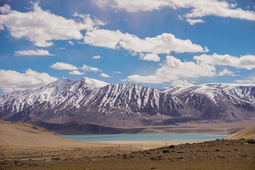Fototapeta na wymiar View of lake ,snow peaks with blue sky ,Leh Ladakh, Jammu and Kashmir, India Beautiful amazing nature background landscape.