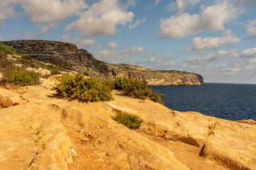 Fototapeta na wymiar view of malta coast and mediterranean sea at blue grotto, malta