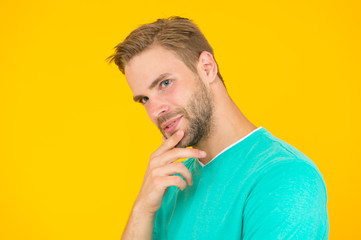inspiring myself. sexy guy yellow background. Male barber care. summer male fashion. Hair and beard care. macho man charismatic look. guy sexy and stylish bristle. handsome man unshaven face