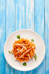 Pasta with pesto, cheese and basil