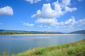 Landscape of river and mountain with blue sky.