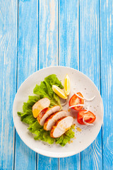 Grilled chicken breast and vegetables