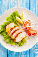 Grilled chicken breast and vegetables