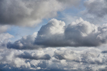 Warm weather background. Art picture of clouds at dusk.