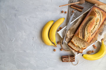 Fresh homemade banana bread with ingredients