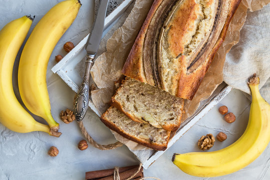 Fresh homemade banana bread with ingredients