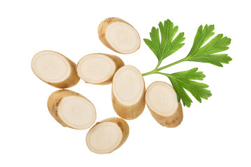 Horseradish root with slices and parsley isolated on white background. Top view. Flat lay