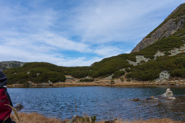 Snow covered mountain peak. Retezat Mountains Panorama. Retezat National Park mountains in South Carpatians, Transylvania, Romania, Europe