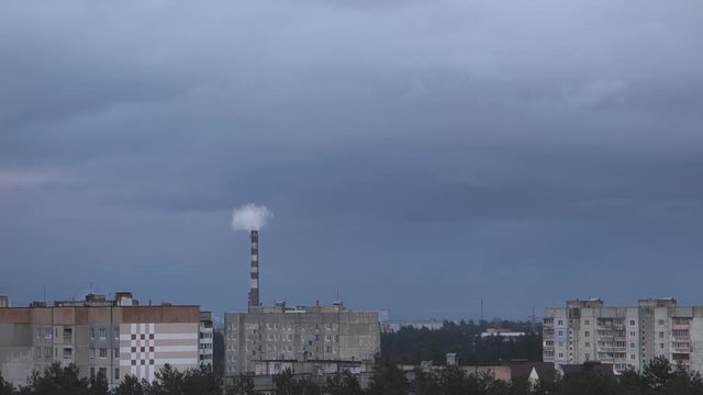 Smoke comes from the factory pipe