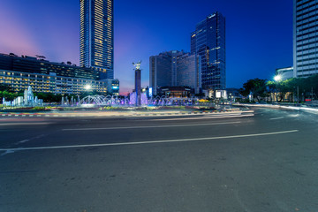 Fototapeta na wymiar Patung Selamat Datang with Bundaran Hotel Indonesia Jakarta