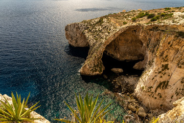 view of malta coast and mediterranean sea at blue grotto, malta