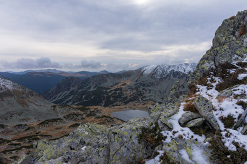 Snow covered mountain peak. Retezat Mountains Panorama. Retezat National Park mountains in South Carpatians, Transylvania, Romania, Europe