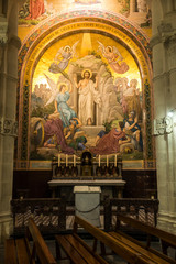 Fototapeta na wymiar Lourdes, France, June 24 2019: Interior of the Rosary Basilica in Lourdes, France.