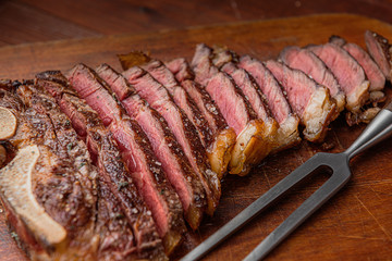 grilled marbled beef steak on a bone