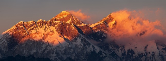 Mount Everest and Lhotse Evening sunset red colored view - obrazy, fototapety, plakaty