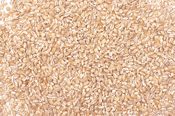 Pearl barley texture close up background.
