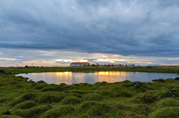 Fototapeta premium Iceland, autumn, sunrise, old farm, Typical icelandic landscape.