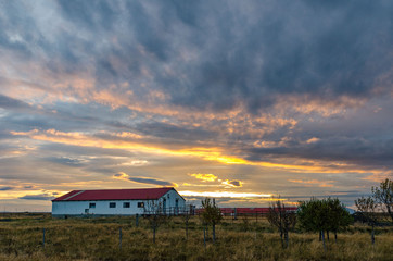 Obraz premium Iceland, autumn, sunrise, old farm, Typical icelandic landscape.