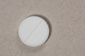 Obraz premium Tablet on craft background from above