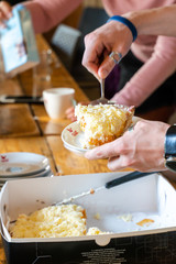 eating a piece of pie from a plate