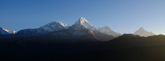 Mountain panorama at sunrise from the viewing platform of Ghorepani Poon Hill, Himalaya, Nepal
